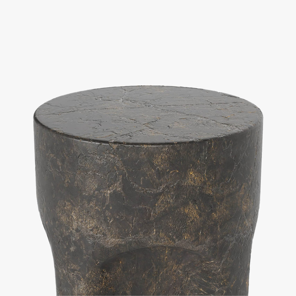 Round stone stool on a white background