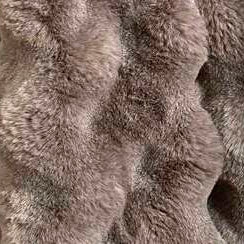 Close-up of a textured chocolate colour fabric surface