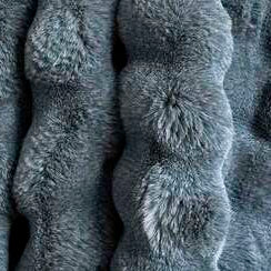 Close-up of textured gray fabric with raised patterns