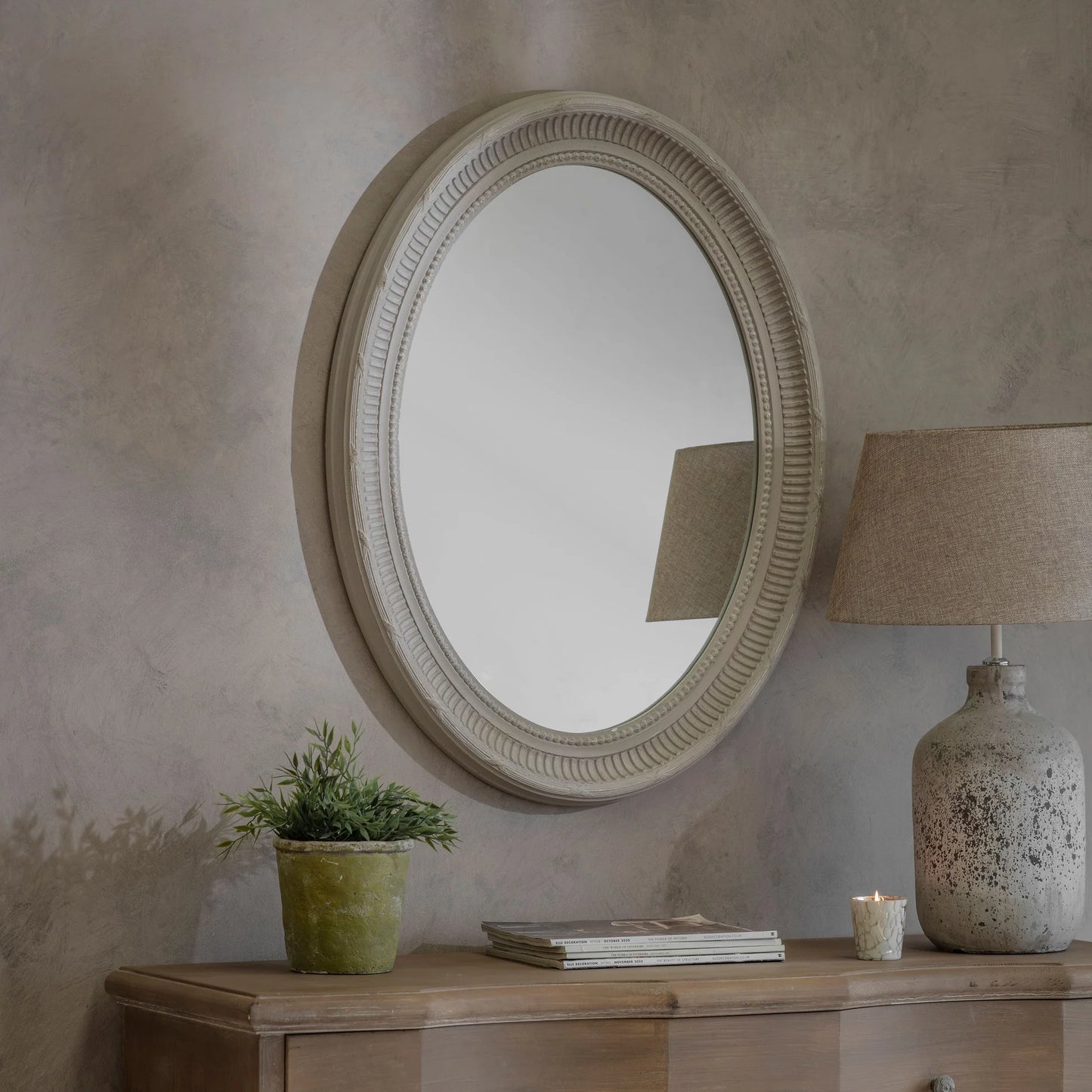 Wilton Oval Mirror With Cut Edge Design
