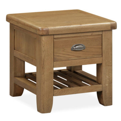 Wooden side table with a drawer on a white background