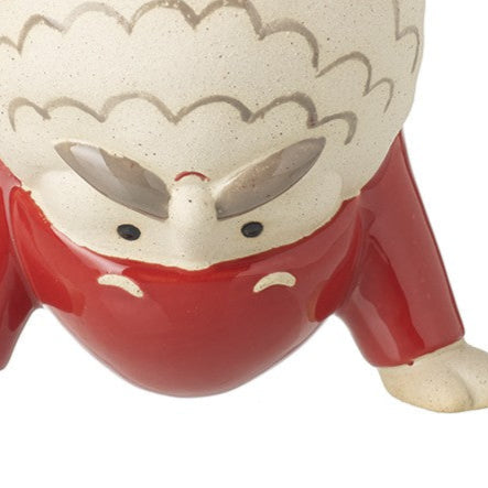 Red mug with a hedgehog design on a white background