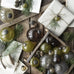 Bag with Eight Mini Autumn Green Glass Baubles 4cm
