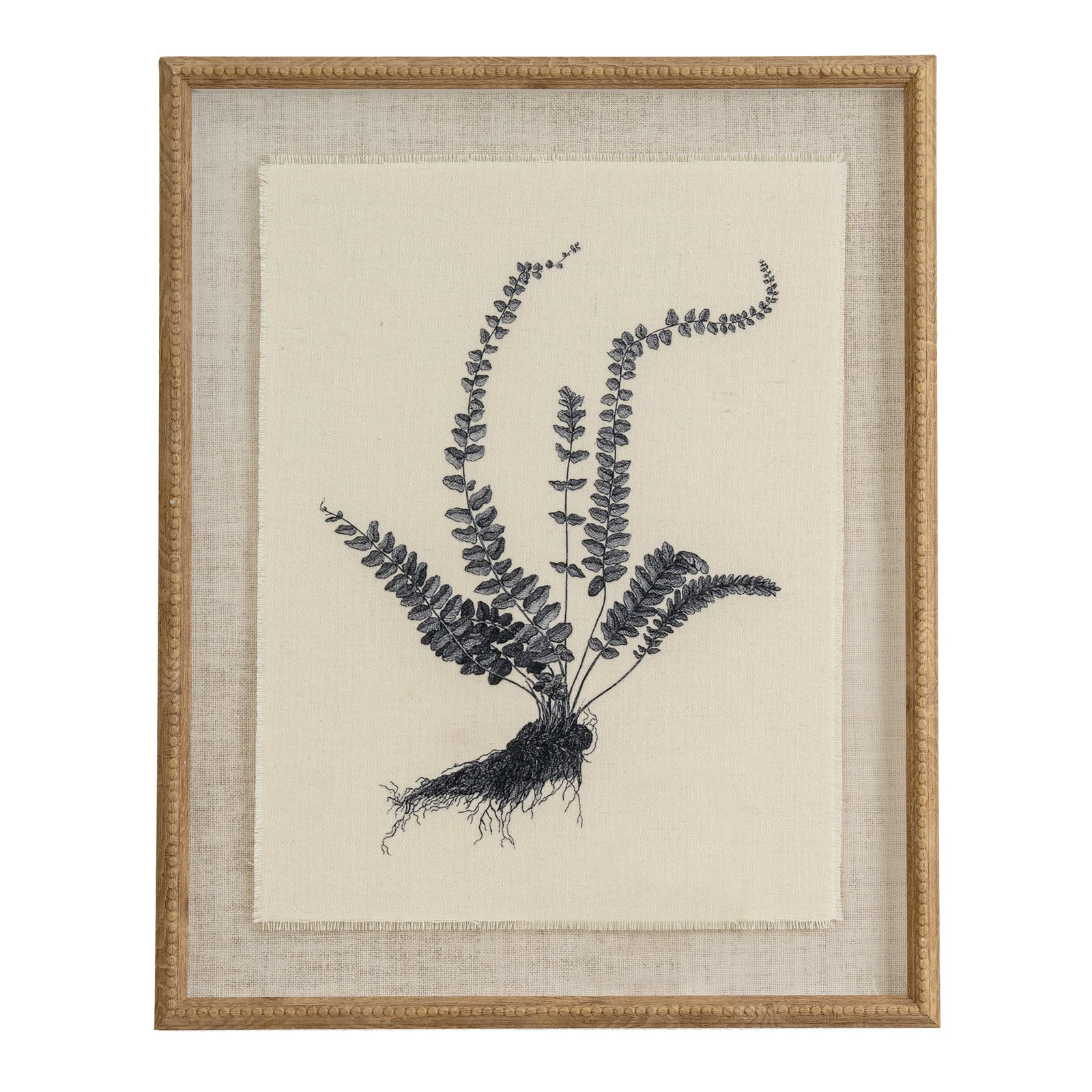 Framed artwork of a black fern on a beige background