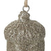 Decorative acorn ornament with glittery texture hanging on a white background