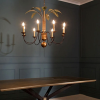 Dunbar Antique Brass and Black Chandelier with Green Leaves